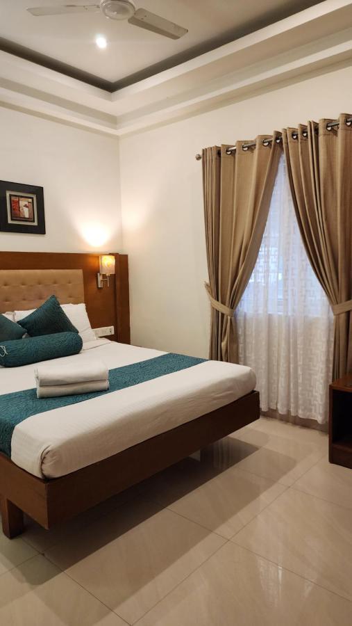 Vishnu Inn Гуруваюр Экстерьер фото
