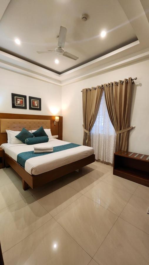 Vishnu Inn Гуруваюр Экстерьер фото